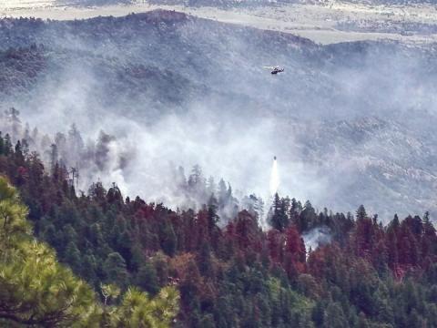 Aerial resources including a helicopter and a Tanker 10, a fixed wing aircraft, are currently engaging in bucket drops to assist with the Oakridge Fire. Courtesy Photo