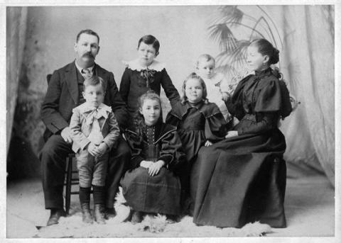 Louisa Gladiuex in the center of her family 1898 Courtesy Photo