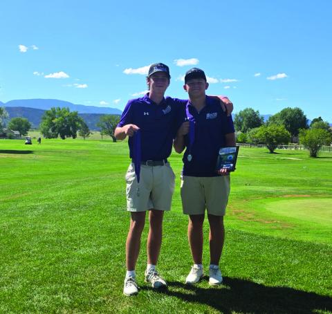 Ty Wood (left) and Kade Kenney display their second and third place medals from the Rye Invitational Golf Tournament Courtesy Photo