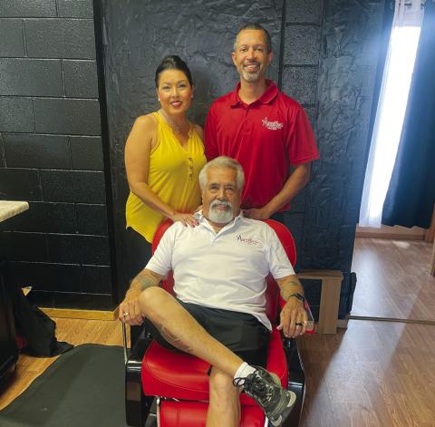 Owners/operators of Aguilar Family Hair Styling, center Louis Aguilar, left Stacie Barrett, right Carlos Barrett Courtesy Photo