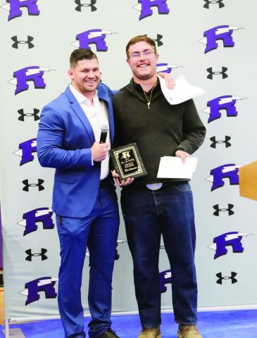 Devin Samuelson with his award and RHS Athletic Director Matt Addington. Devin also earned a $1000 scholarship for receiving the PJ Craver Award. Photo Courtesy of Kacie Anglin