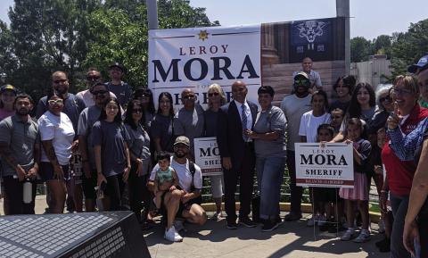 Leroy and Kathy Mora, surrounded by supporters, officially announced Mora's candidacy for Pueblo County Sheriff. Courtesy Photo