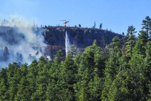 A Beulah Fire Protection helicoptor as well as approximately 90 firefighters from multiple agencies fought the Northcreek Fire. Courtesy Photo