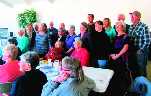 Former VFC President Susan Kalman was surrounded by friends at a breakfast held in the community center bearing her name. Photo by Shirley Pigg
