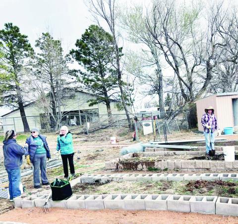 Community Garden volunteers show up to assist with spring over-See haul and get ready for memorial tributes. Courtesy Photo