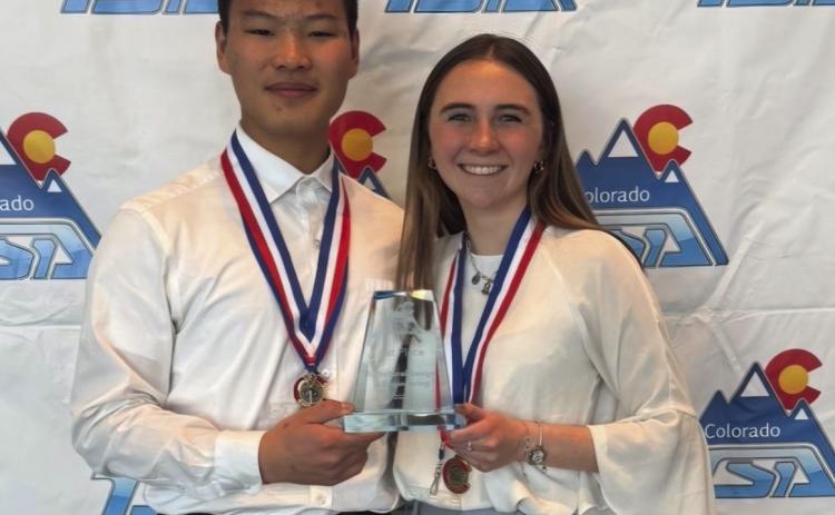Adin Poehlein and Ozzira Garrison with their first-place trophy and medals Courtesy Photo