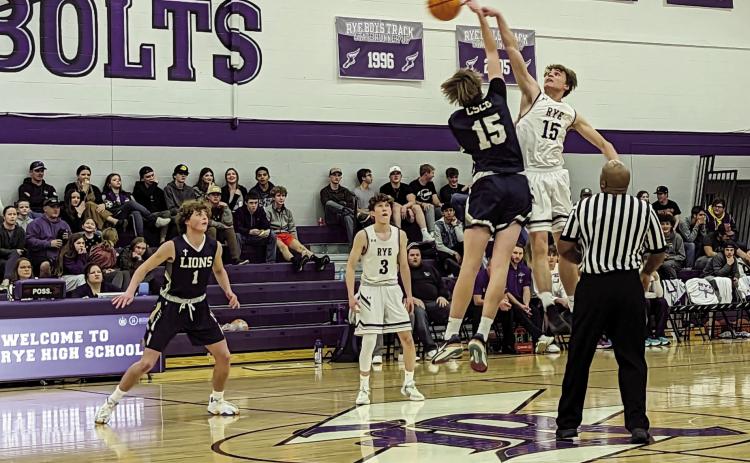 Rye High’s Codah Graber #15 shoots over CSCS player in the contest January 17 on the home court. Courtesy Photo