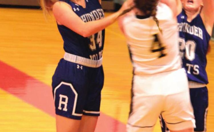 Rye sophomore Alaina Bourgeois (34) blocks the shot of 2A Sargent's Mary Willis (4) during Day 2 action at 3A Centauri's Mountain Top Classic, Dec. 2-4 in La Jara. Photo courtesy of Joel Priest