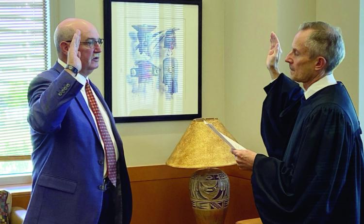 Sixteen-year Pueblo County Sheriff Kirk Taylor is sworn in as the 31st U.S. Marshall for the District of Colorado by U.S. District Court Chief Judge Phillip Brimmer. Courtesy Photo