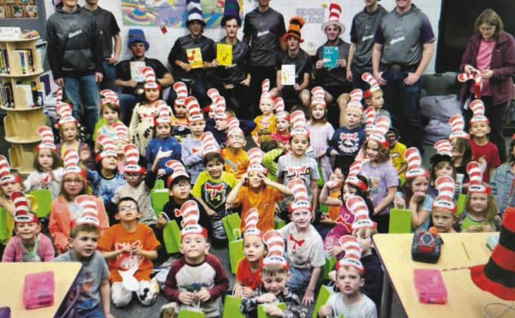 Read Across America Day 2025 was celebrated on Monday, March 3, at Rye Elementary. It is held annually on a school day closest to March 2nd, which is the birthday of American author Dr. Seuss. The Rye High School Baseball team joined the effort to inspire young readers. Read the full article on p. 5 Courtesy Photo