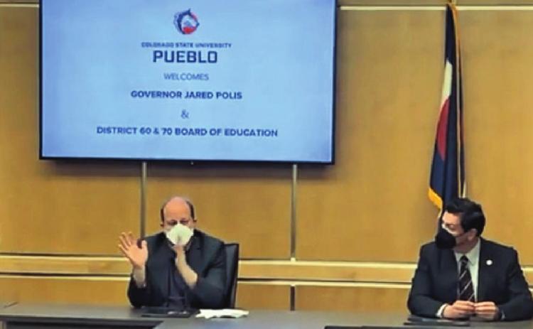 Governor Jared Polis and Colorado Senate President Leroy Garcia present information while meeting with the Pueblo County School Board members. Courtesy Photo