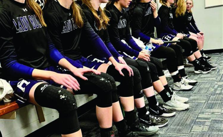 BEST PHOTOGRAPH - 2022 First Quarter Review, by Sue Barcus. The Rye High School girls basketball team listens to their coach in an undefeated regular season, and a third place finish in the 2A State Tournament. Photo by Sue Barcus