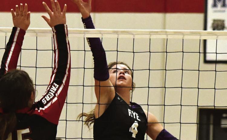 Rye senior Taylor Pye (4) tips a shot over Hoehne's Ayshia Swetky (25) during a 25-12, 25-16, 25-14 sweep of the Santa Fe League rival Lady Farmers at the Class 2A-Region 11 tournament held Friday, November 7, in Ignacio. Photo Courtesy of Joel Priest