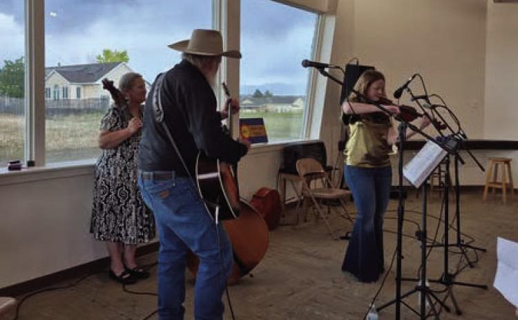 Part of the Ryan fiddling family- Don,Charlotte, Max, and Joy. Courtesy photo
