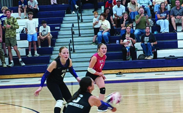 Sophomore Reese Simpson returns a volley against Las Animas. The Thunderbolt team lost a narrow 3-2 decision on the home court. Photo by Terry Kraus