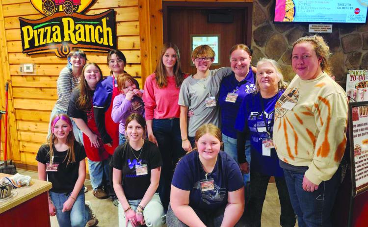 The hard-working Color Guard group paused for a quick picture before going back to their duties for the Pizza Ranch fundraiser. Photo by Shirley Pigg
