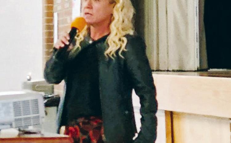 Rye High School Principal Michelle Mann Madril, pictured here announcing at a school assembly, will retire at the end of the 2024 school year. Photo by Shirley Pigg