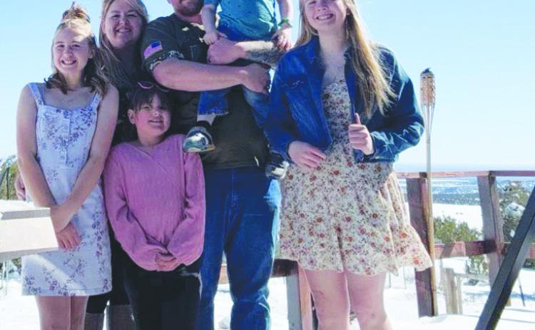 Jason and Lacey Lovelace and their family at their Beulah home. Lovelace is the Republican Chairman of House District 46, the largest district in Colorado. Courtesy Photo