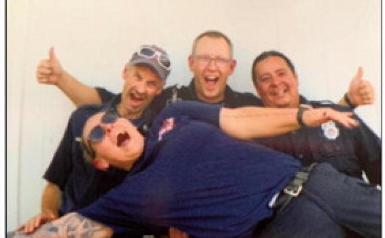 Rye Fire Protection District paramedic and firefighter, Molly Lantis, with firefighting colleagues from RFPD. Courtesy Photo