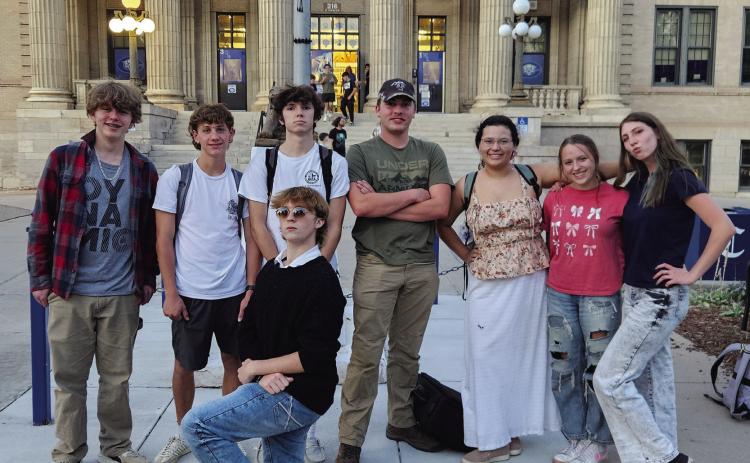 The 2025 RHS Knowledge Bowl team: standing, L-R: Avery Koons, Carter Ford, Justin Siudyla, Mathius Lorenz, Marie Martinez, Kaci Ford, Miriam Peterson. Kneeling: Azi Moore Courtesy Photo