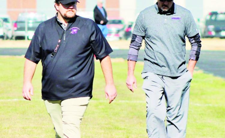 Assistant Coach Matt Graber and Head Coach Conner Pigg take the field in a playoff game against Yuma. Courtesy Photo