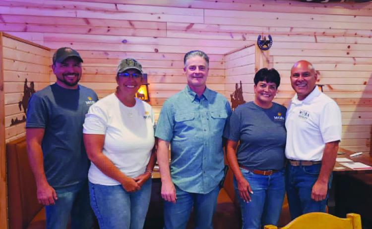 Leroy and Kathy Mora (right) spent time at Three Sisters answering questions regarding the Pueblo County Sheriff Election in November. Photo by Shirly Pigg