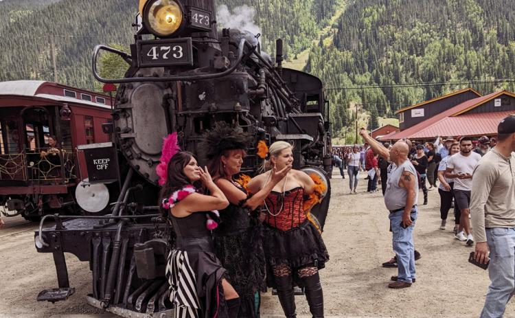 Saloon girls meet the Durango &amp; Silverton Narrow Guage train at Silverton, Colorado Photo by Lori Kraus