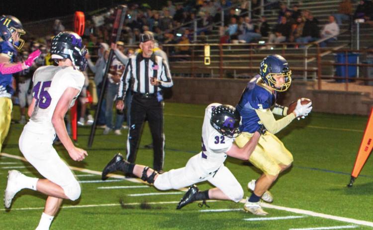 Photo by Sue Barcus It took the Colorado Springs Christian Lions until the end of the second quarter to score a touchdown. The T-Bolts held off a second touchdown up through the end of the third quarter but the Lions concluded the game beating Rye 17-0 at their home conference game on Saturday, Oct. 23 in Colorado Springs. Sam Chianelli, #32 stopping the Lions offense within 2 yards of the goal line.