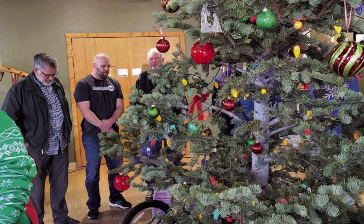 A number of Christians met at Table Mountain Church in Rye, Colorado to pray over the kids receiving the toys that local churches have provided for Hope &amp; Home foster children. Courtesy Photo