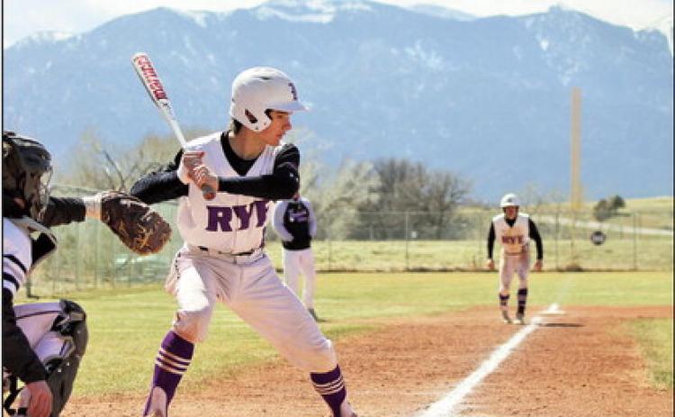 Rye High School batter Will Hamler concentrates on bringing teammate Brandon Benz home from third. Photo by Karen Rochester