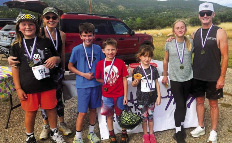 Some of the winners of the Hoof It 4 Harlie 5K: (L-R) Dundy Teeter, Chloe Teeter, Joey Rothschild, James Rothschild, Penny Gallegos, Rosie Christenson, and Rocky Banta. Courtesy Photo