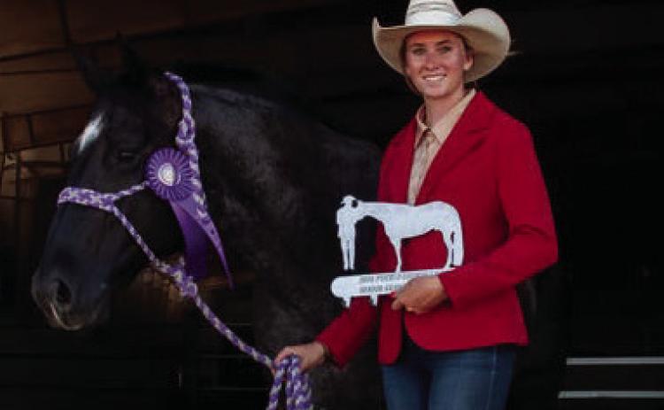 Local Donna Fern aced many different classes in the horse show, claiming reserve and grand champion placings, all while also working long, hot days to Courtesy Photo