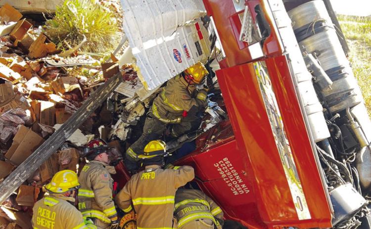 Numerous emergency services responded to a fatal accident on I-25 Friday. Courtesy Photo