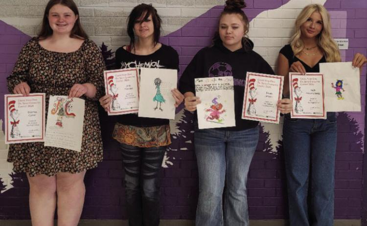 Brianna Carter, 10th grade, Zelic Hoosier, 12th grade, Sarah Jessop, 12th grade, and Kayla Himmelberg, 11th grade, had great fun creating Dr. Seuss characters. Courtesy Photo