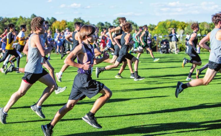 Photo by Sue Barcus Runner Mason Ford starting his run with six other teams at the Pueblo City/County Championships on Wed., Oct. 13. Ford finished in 18th for Rye at 21:40.90.