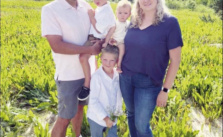 Ian Martinez-McGraw. holding Jeter, Maddux is standing and the baby is Griffey. Far right is Ian’s wife, Aubry. Courtesy Photo