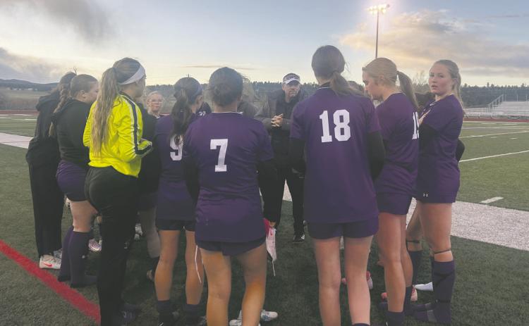 Coach Crowell rallies the girls soccer team against Lamar. Rye tied the 3A powerhouse 2-2 on their home field. Courtesy Photo