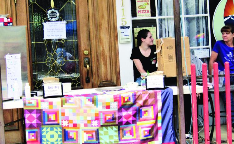 Photo by Shirley Pigg The Rye Cafe closed its interior and sold pizza on the sidewalk to participate in the Town Square Fair.