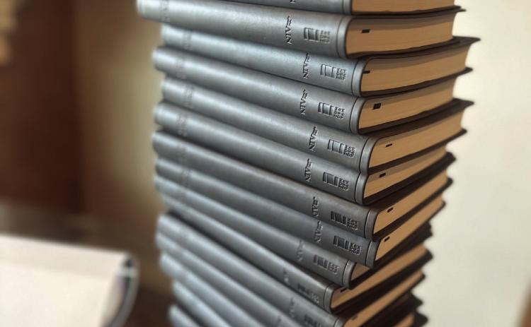 Some of the 250 Bibles given to Senior High School graduates who attended the D70 Baccalaureate. Courtesy Photo