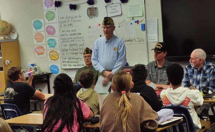 VFW LTC Fred A. Ettleman Post #7305 members Jerry Collins, Tom Howard, Matt Acres, and Don Shumake (L-R) visited Mrs. Sonnleitner's class at Craver Middle School Courtesy Photo