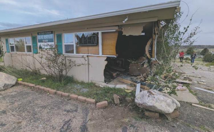 Southern Colorado Real Estate Brokers office damaged by run-away vehicle on Sunday evening Courtesy Photo