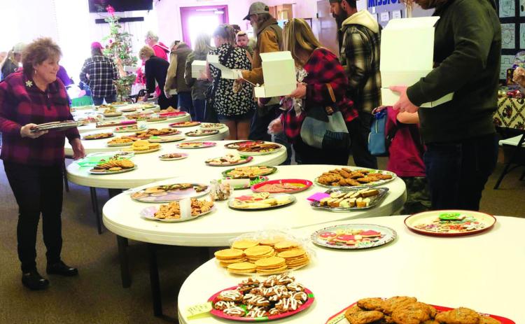 All kinds of cookies, candies, and baked goods filled the tables at the Christmas Cookie Walk held at the Rye Home United Methodist Church on Saturday, December 13. Photo by Shirley Pigg