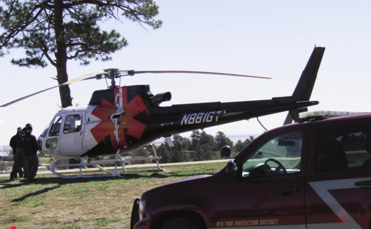 The Rye Fire Protection District, Pueblo County Sheriff's Office, and Flight for Life helicopter took over the Rye High School’s parking lot on Thursday, April 7 from 9-11 am. These amazing organizations set up a simulated “prom night” car crash to remind students to be safe while driving to and from their upcoming prom. Photo by Shirley PIgg