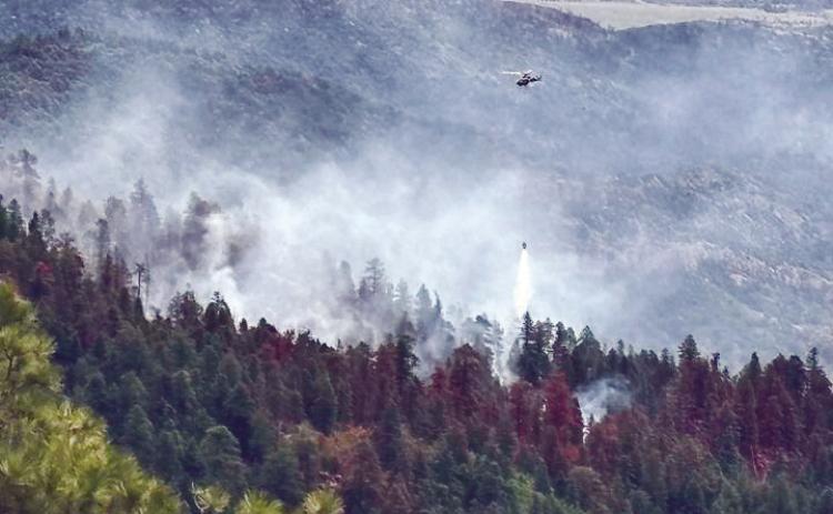 Aerial resources including a helicopter and a Tanker 10, a fixed wing aircraft, are currently engaging in bucket drops to assist with the Oakridge Fire. Courtesy Photo