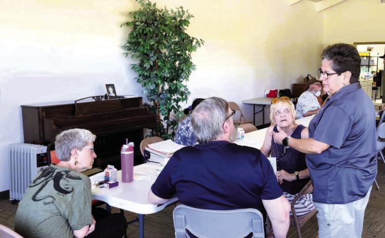 Dina Godinez, Pueblo Area Agency on Aging Program Coordinator, took time to answer one-on-one questions about the organization and the services they offer. Courtesy Photo
