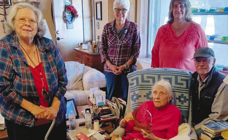 Book Club members visisted Joye Marostica at her home to honor her for starting the book club 35 years ago. L-R Mary Helen Finley, Phyllis Hochstetler, Joye Marostica seated, Shirley Pigg, Steele Wotkyns. Courtesy Photo