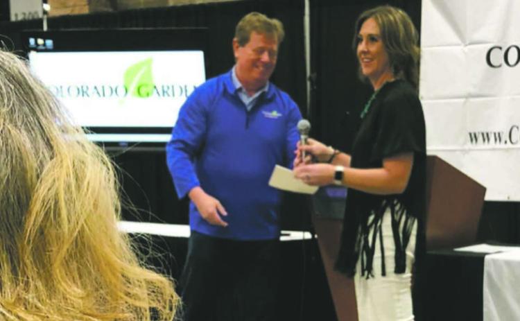 Ashley Tremain accepts the $75,000 check for the Craver FFA Program Courtesy Photo