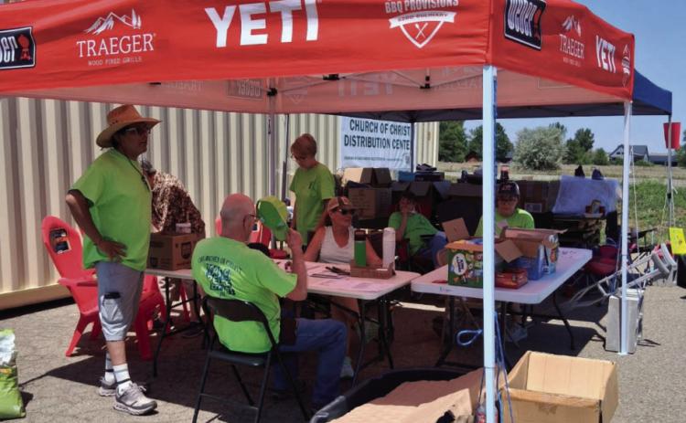 Members of the Rye Church of Christ pass out necessities to victims of the Aspen Creek Fire Courtesy Photo