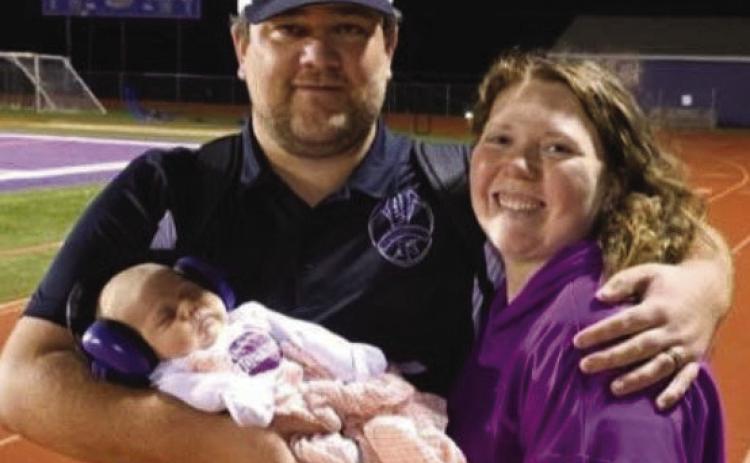 Coach Connor Pigg, wife Maddie, and their daughter Kennedy Rose Pigg. The couple are expecting twins in November. Courtesy Photo