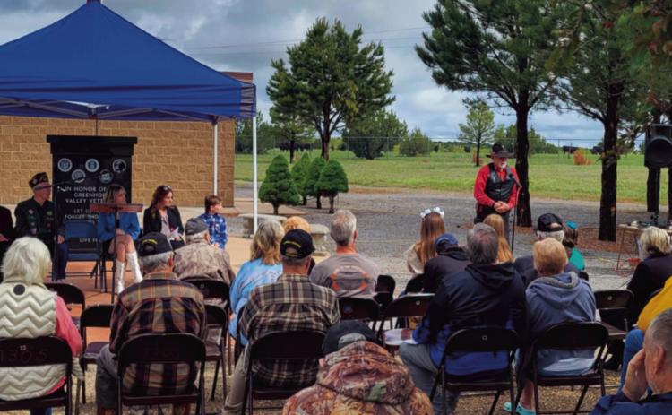 Don Shumake, a decorated veteran, shares memories of his family and their military service at the Colorado City ceremony hosted by the LTC Fred A. Ettleman Veterans of Foreign Wars Post 7305 on Monday. Shirley Pigg